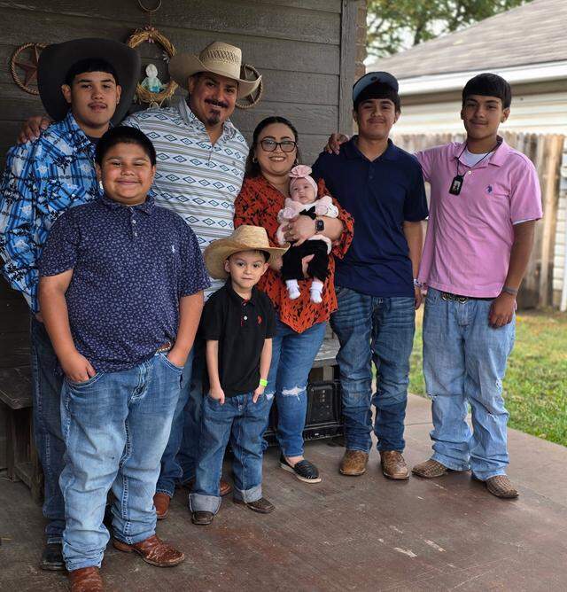 Jesus Gonzalez, far right, with his family which includes four brothers and a baby sister.