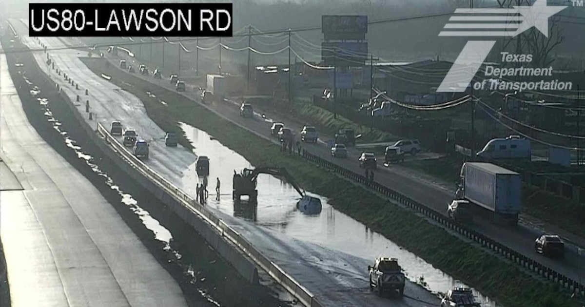 Flooding closes eastbound U.S. 80 in Forney, car stranded in pooled water