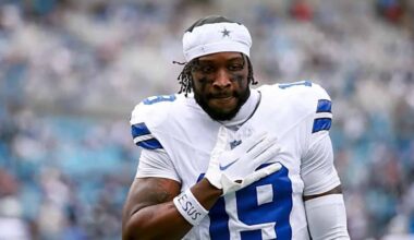Close-up of Ryan Flournoy in Dallas Cowboys uniform wearing a white headband before kickoff