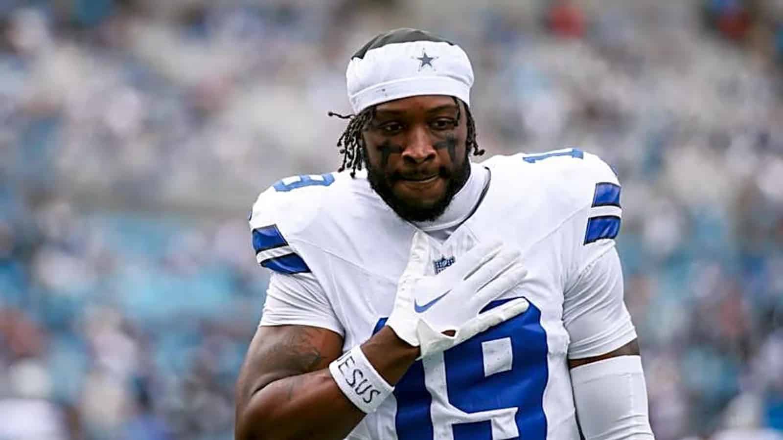 Close-up of Ryan Flournoy in Dallas Cowboys uniform wearing a white headband before kickoff