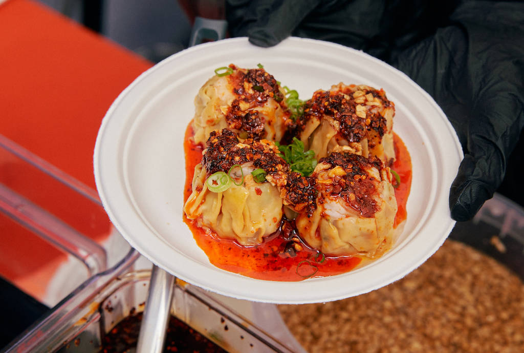 Image shows a plate of dumplings served at Panda Fest. 