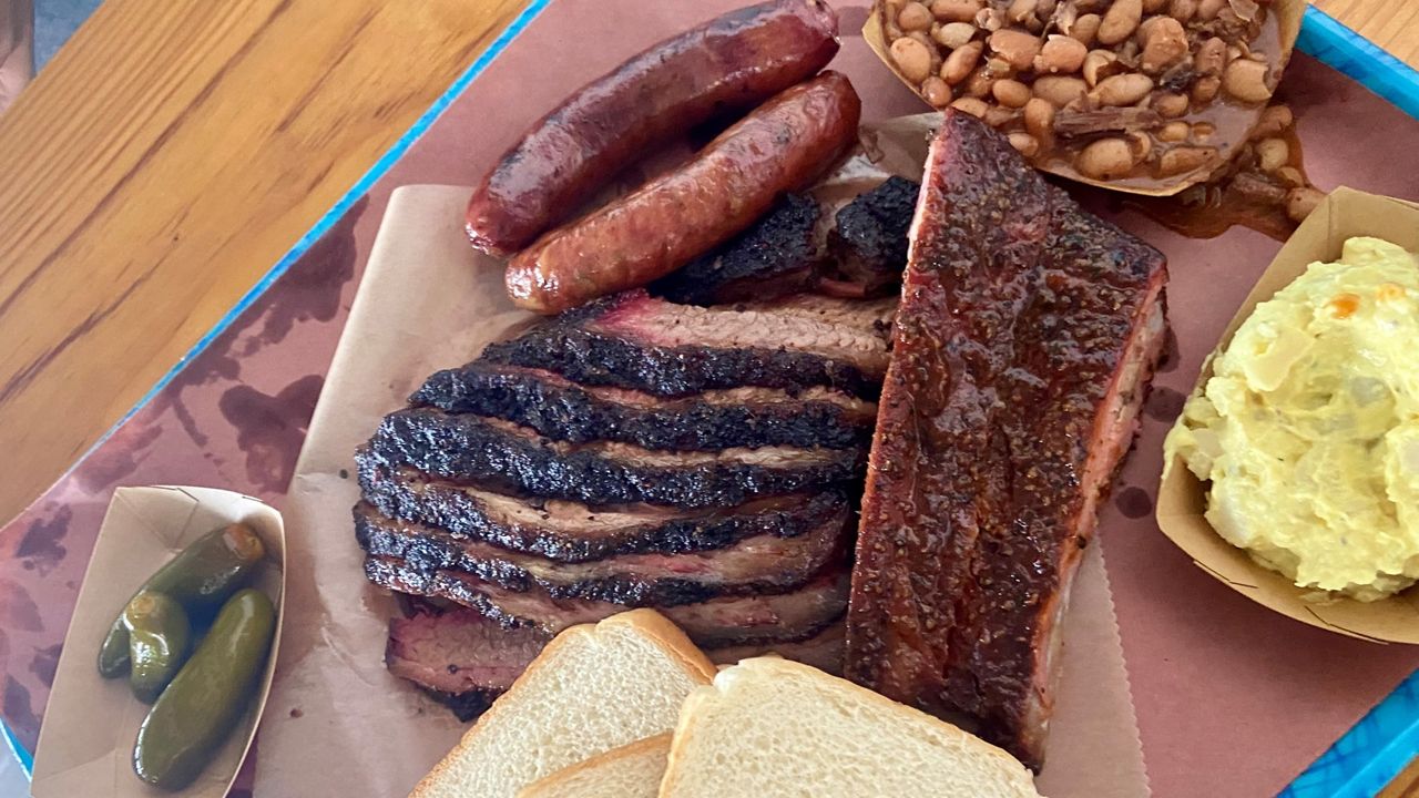 An assortment of brisket, sausage, pork ribs and sides from Franklin Barbecue in Austin, Texas, on June 2, 2024. (Spectrum News 1)