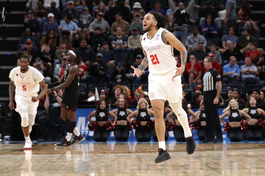 MEMPHIS, TENNESSEE - MARCH 24: Emanuel Sharp #21 of the Houston Cougars reacts during the first half against the Texas A&M Aggies in the second round of the NCAA Men's Basketball Tournament at FedExForum on March 24, 2024 in Memphis, Tennessee. (Photo by Justin Ford/Getty Images)