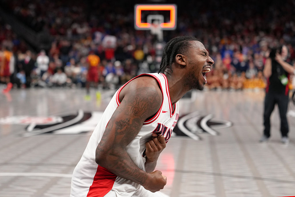 KANSAS CITY, MISSOURI - MARCH 13: Jaden Bradley #0 of the Arizona Wildcats celebrates after hitting the game-winning basket against the Iowa State Cyclones in the second half during the semifinals of the Big 12 Tournament at T-Mobile Center on March 13, 2026 in Kansas City, Missouri. (Photo by Ed Zurga/Getty Images)