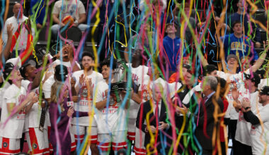 KANSAS CITY, MISSOURI - MARCH 14: The Arizona Wildcats celebrate after winning the Big 12 Tournamen...