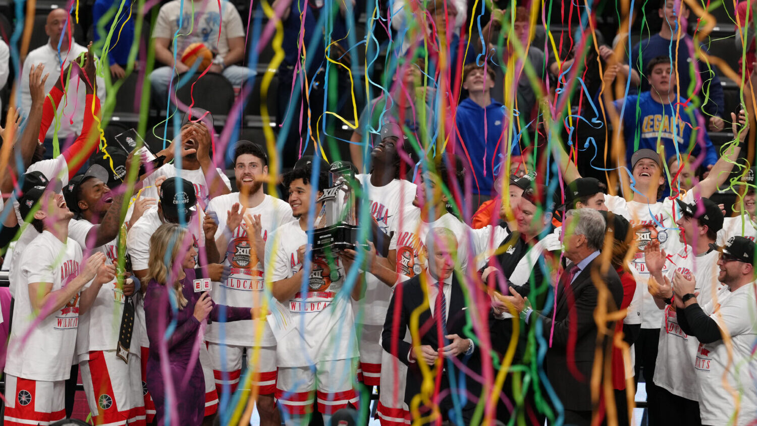 KANSAS CITY, MISSOURI - MARCH 14: The Arizona Wildcats celebrate after winning the Big 12 Tournamen...