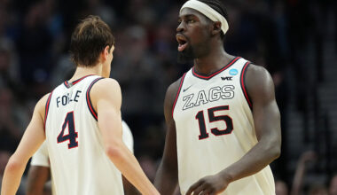 PORTLAND, OREGON - MARCH 19: Davis Fogle #4 and Graham Ike #15 of the Gonzaga Bulldogs celebrate against the Kennesaw State Owls during the second half in the first round of the 2026 NCAA Men's Basketball Tournament at Moda Center on March 19, 2026 in Portland, Oregon. (Photo by Soobum Im/Getty Images)