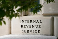 In this May 4, 2021, file photo, a sign outside the Internal Revenue Service building is...