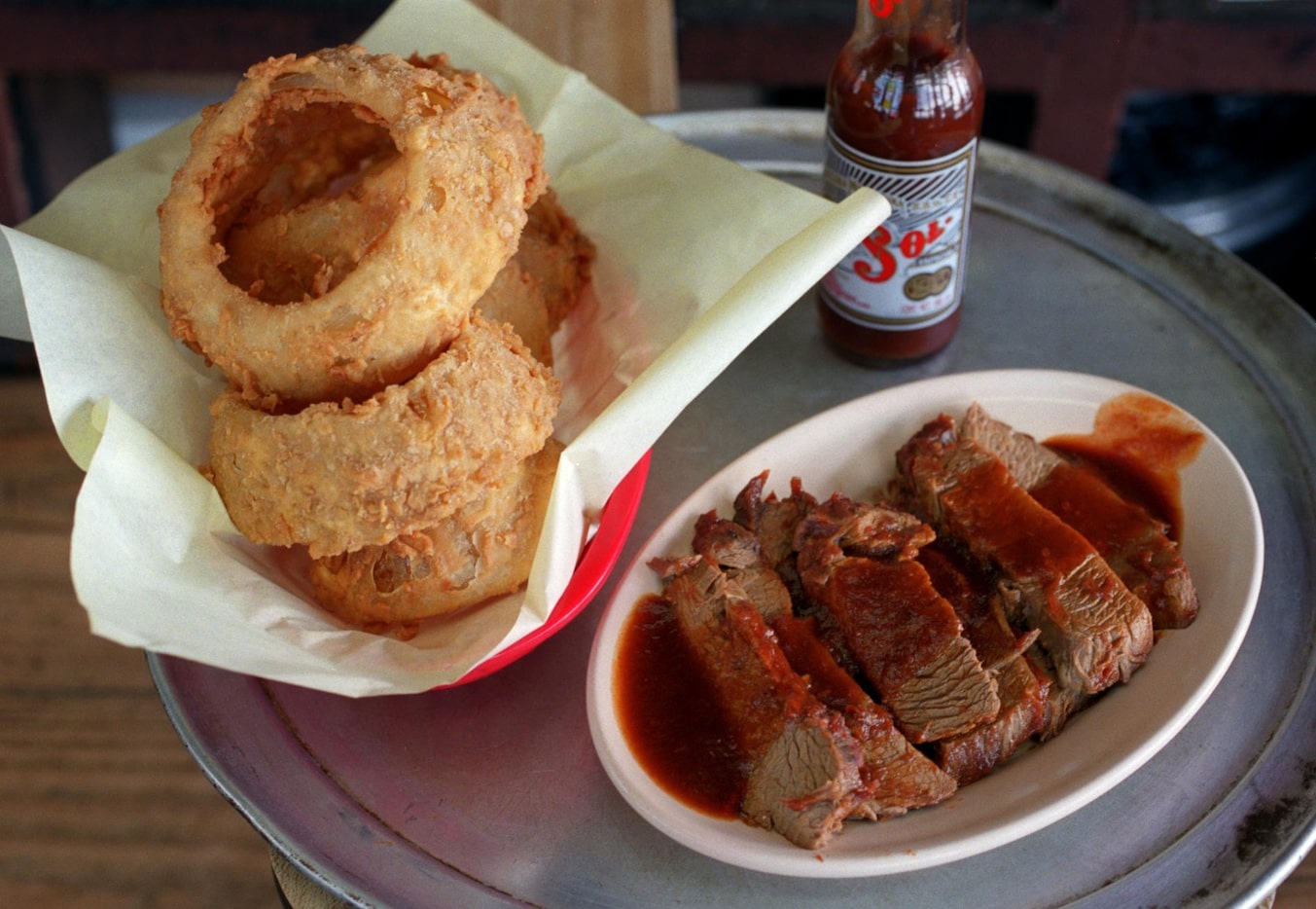 Onion rings, sauce and brisket from The Original Sonny Bryan's Barbecue location on Inwood....