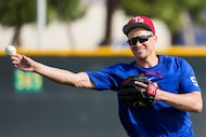 Texas Rangers shortstop Corey Seager participates in a fielding drill during a spring...