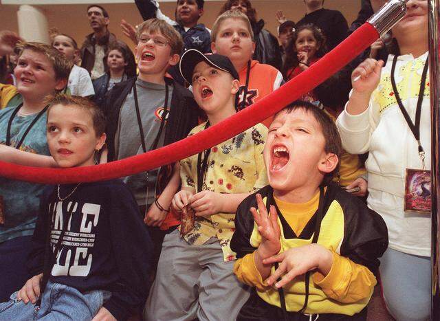 March 1, 2003: Ten-year-old Oscar De La Garza screams out his answer to a trivia question during the 12-week 12-stop Yu-Gi-Oh! Trading Card Game Mall Tour at Ridgmar Mall. By answering trivia questions, participants could win bonus card packs to help enrich their existing card collections.
