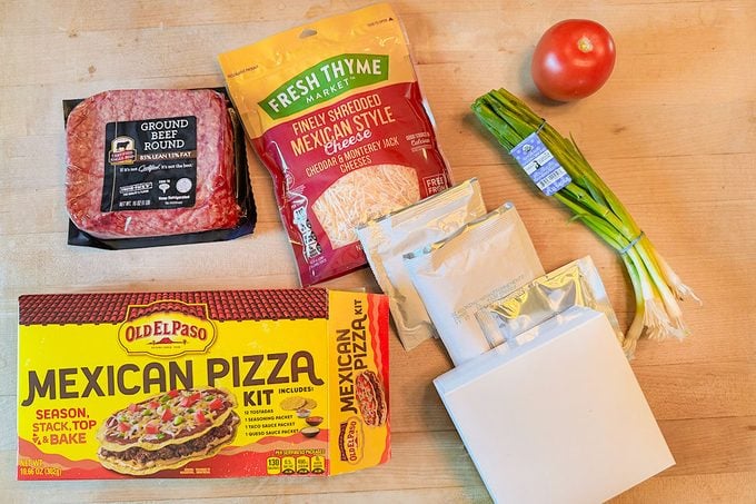 Various packages from Mexican Pizza Kit is placed on a table