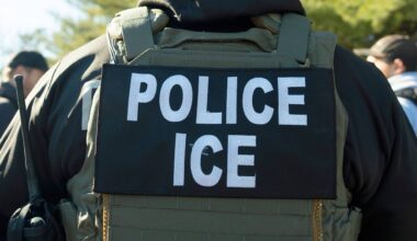 A U.S. Immigration and Customs Enforcement officer listens during a briefing, Jan. 27, 2025, in Silver Spring, Md. (AP Photo/Alex Brandon, File)
