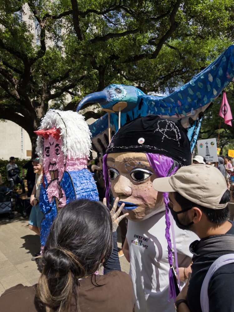 Protestors marched from Houston City Hall to the George R. Brown Convention Center in opposition to SERAWeek. March 23, 2026.
