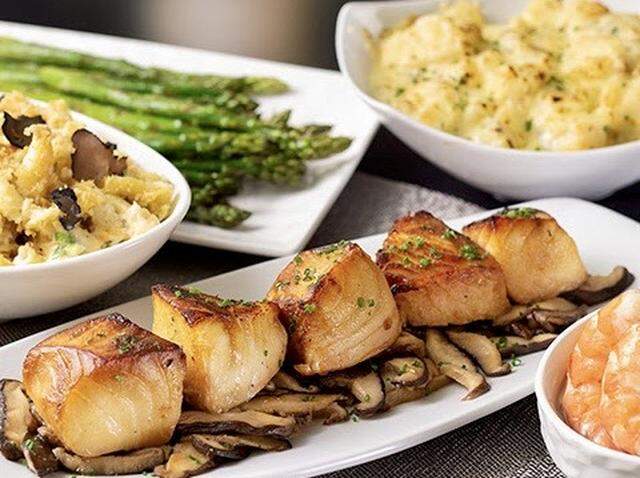 A sea bass dinner with sides for six people is on the menu at Eddie V’s.