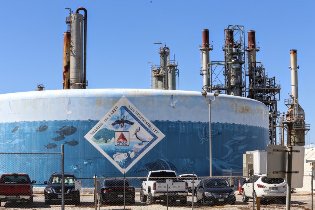 A mural depicts sea life on a chemical tank at a Citgo refinery. Credit: Dylan Baddour