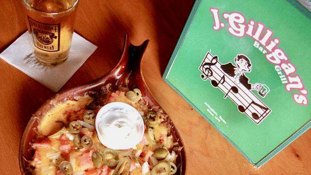 “Irish nachos” potato skins originated at J. Gilligan’s in Arlington.