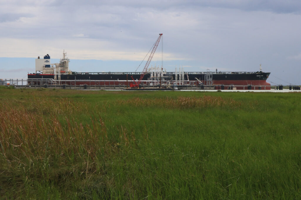 A crude tanker docks at the Enbridge terminal amid saltwater wetlands. Credit: Dylan Baddour