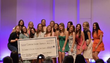 Alpha Chi Omega members celebrate after revealing the total amount raised during last year’s Real Chic Women Fashion Show. (Photo courtesy of Alpha Chi Omega)