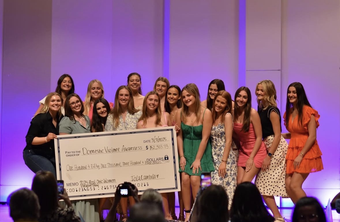 Alpha Chi Omega members celebrate after revealing the total amount raised during last year’s Real Chic Women Fashion Show. (Photo courtesy of Alpha Chi Omega)