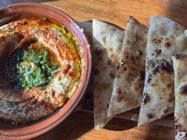 Hummus served with pizza bianca at Felina in Near Southside of Fort Worth.