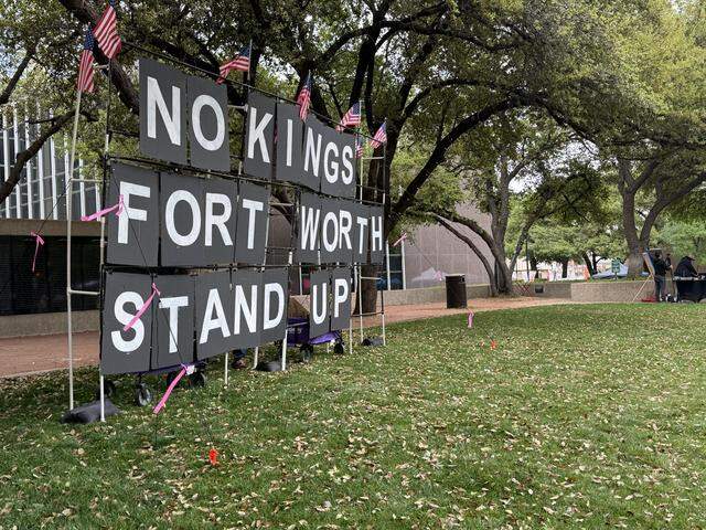 A sign displayed at General Worth Square during Fort Worth’s No Kings protest Saturday afternoon.