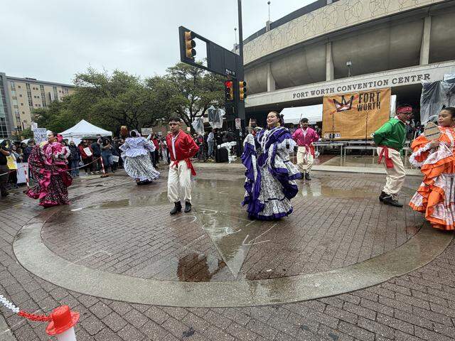 Dancers performed in front of the Fort Worth Convention Center at the beginning of the No Kings protest Saturday.