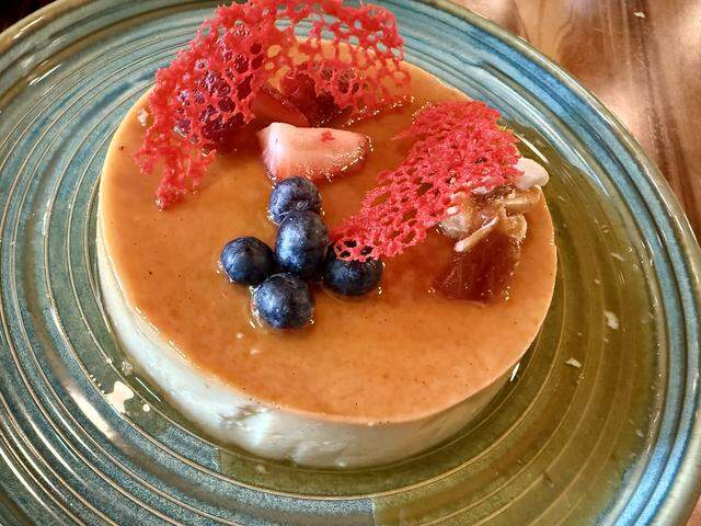 The 30-hour homestyle flan at Dos Mares is topped with macadamia brittle; seen Feb. 8, 2026.