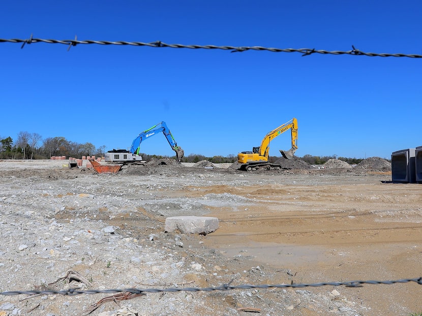 Excavators work on a University Hills construction site near East Wheatland and South...
