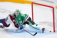 Colorado Avalanche center Martin Necas (88) scores a shootout shot against Dallas Stars...
