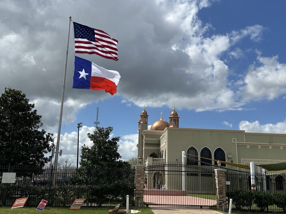 An American flag and a Texas flag wave above the Maryam Islamic Center in Sugar Land on March 3, 2026.