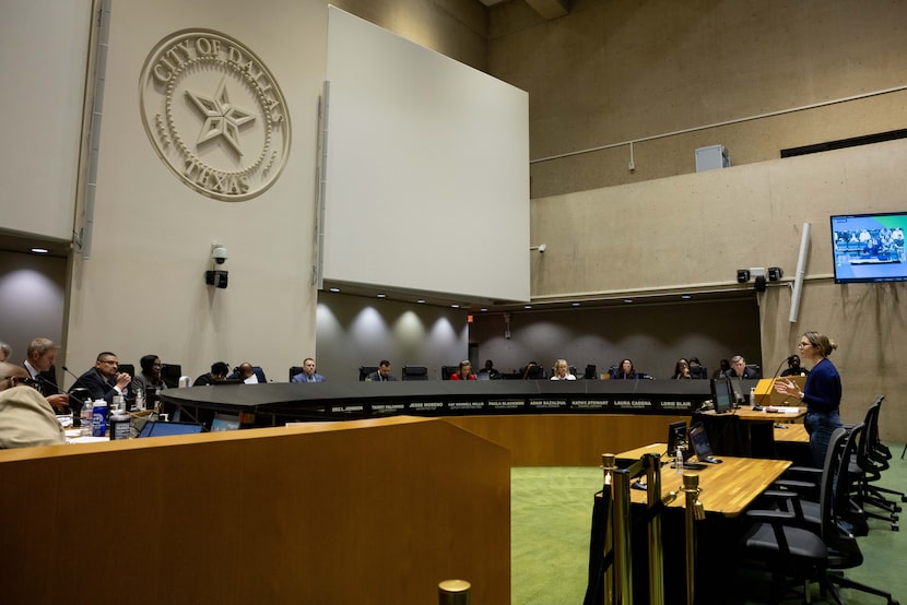 Sarah Crain, executive director of Preservation Dallas, speaks in favor of keeping City Hall...