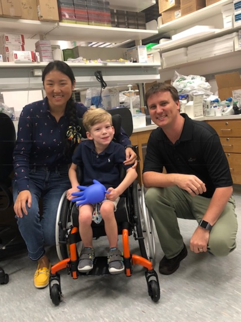 Will Woleben, pictured in 2018 at age 6, of McKinney, visits with UT Southwestern Medical...