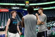 Former Duke teammates, Charlotte Hornets guard Kon Knueppel, from left, Charlotte Hornets...