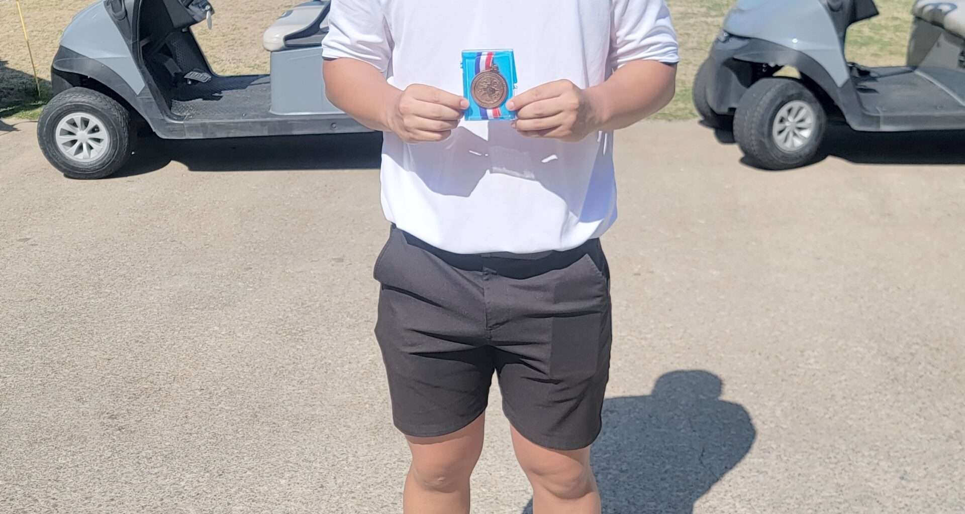 Li shrugs off sluggish start, qualifies for regional golf tournament