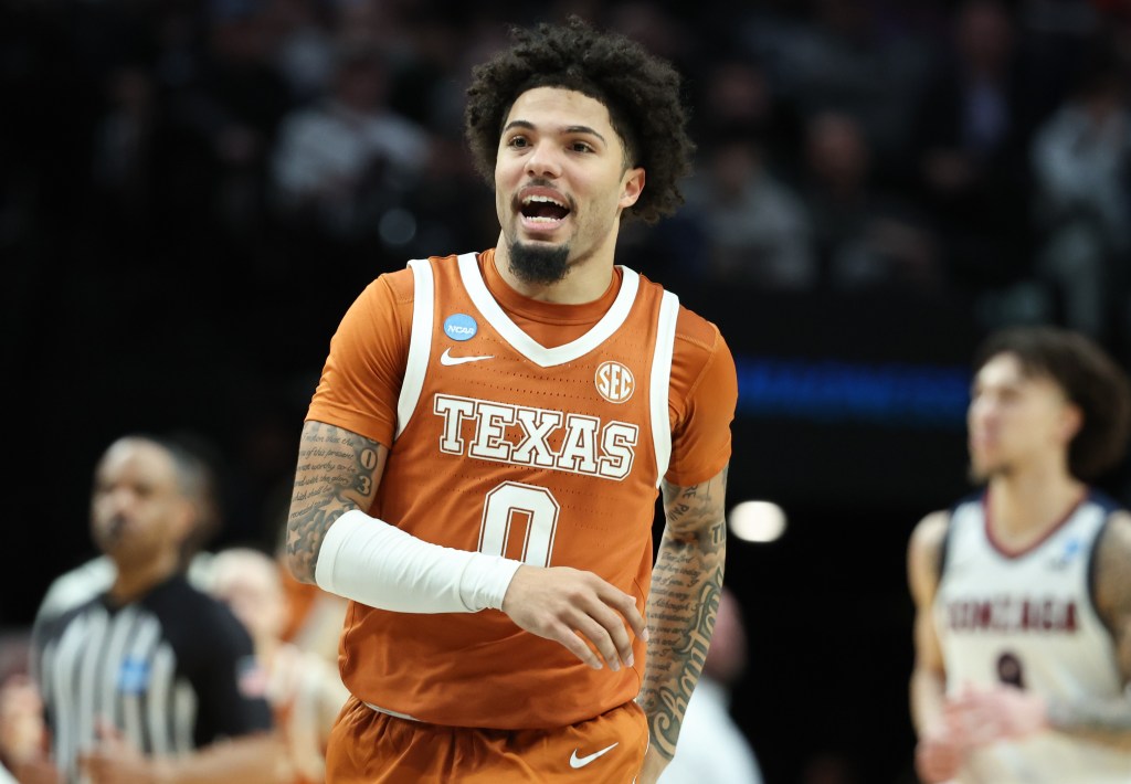 Jordan Pope, who scored 17 points, celebrates during the second half of Texas' win over Gonzaga in the second round of the NCAA Tournament.