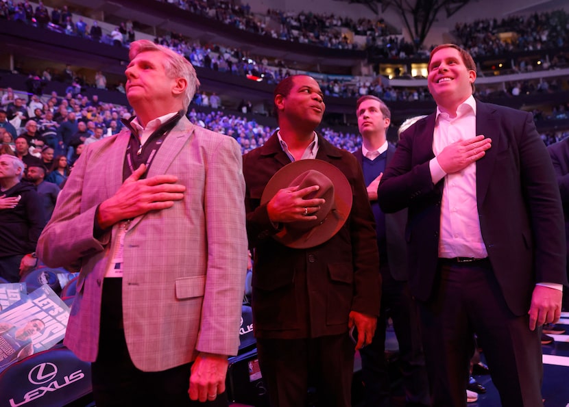 Dallas Mavericks CEO Rick Welts (left) joined Dallas Mayor Eric Johnson (center) and team...
