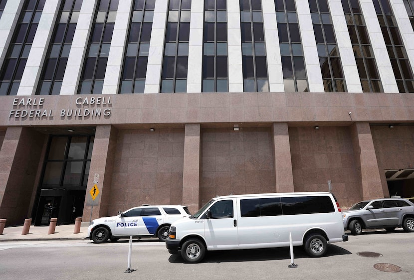 A van exits the Earle Cabell Federal Building on Thursday, May 22, 2025, in Dallas.