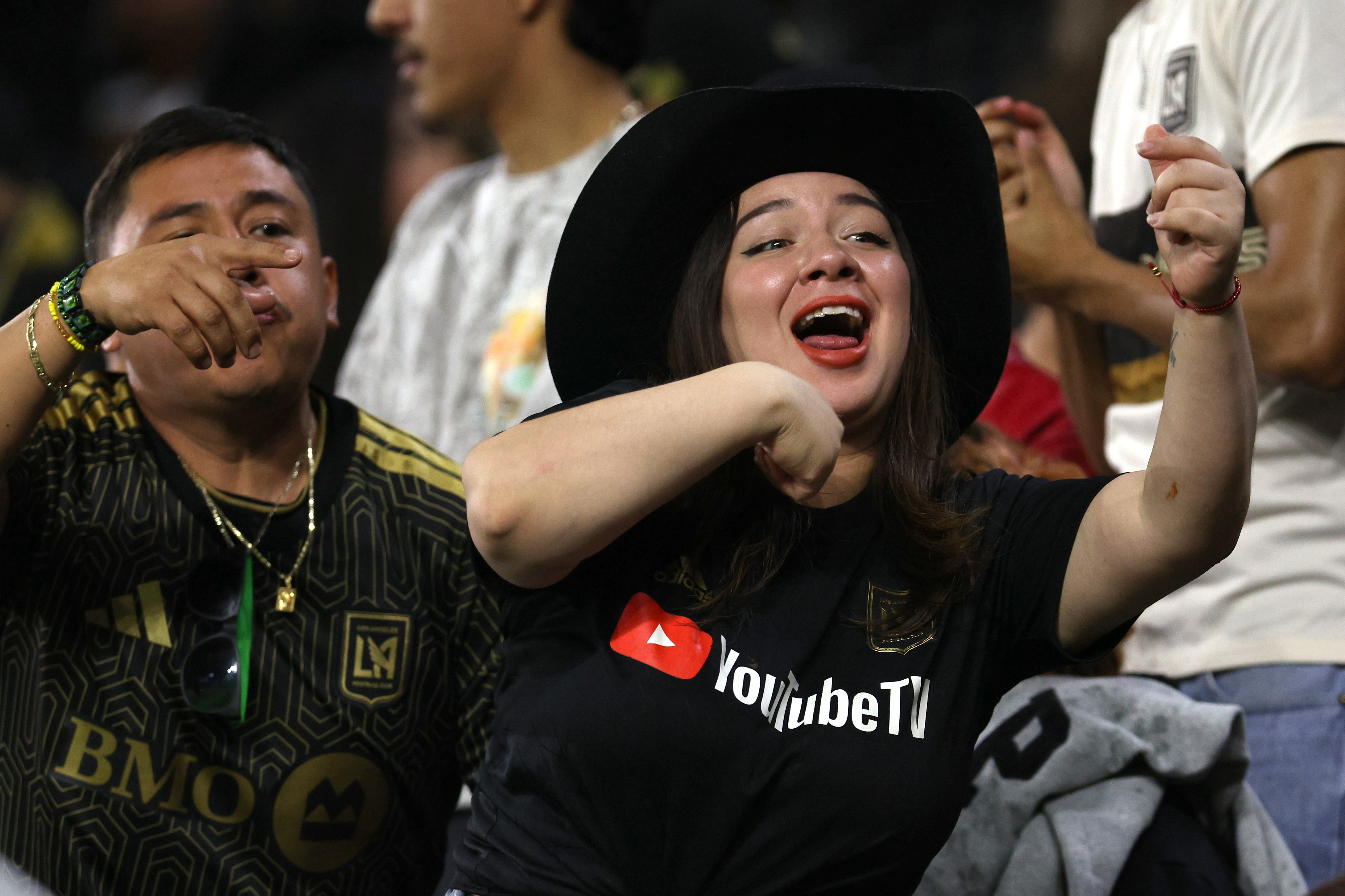 LAFC fans cheer during the second half of an MLS...