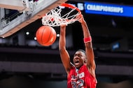 Carter guard Kaiden Eason (32) dunks the ball during the first half of the Class 4A Division...