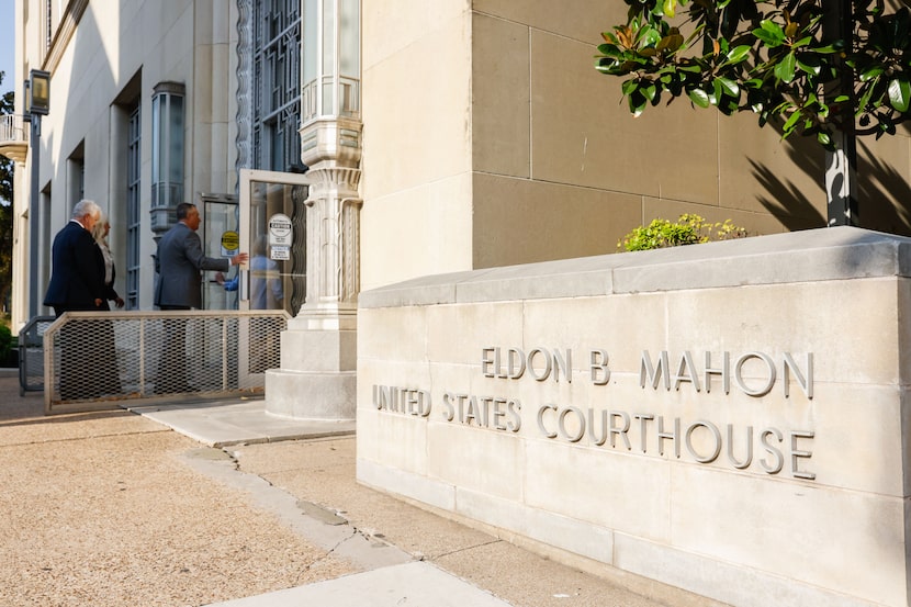 People enter the Fort Worth Federal Courthouse in Fort Worth on Friday, May 20, 2022.