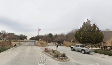 Why is a public road in a Tarrant County gated community?