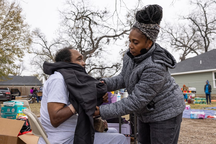 Volunteer Nicole Davison with Purses with Purpose and Epic Fellowship, helps Mill City...