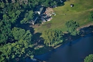 This aerial photo shows damage to Camp Mystic from flash floods along the Guadalupe River in...
