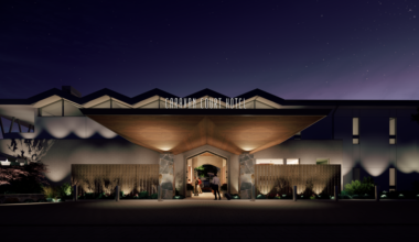A rendering of the main entrance to the Caravan Court Hotel opening in spring 2026 on Division Street in Arlington.