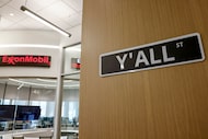 A stock ticker is seen near a Y’all Street sign at Texas Capital, Wednesday, Nov. 12, 2025,...