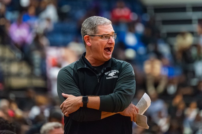 North Crowley coach Tommy Brakel watches from the sidelines.