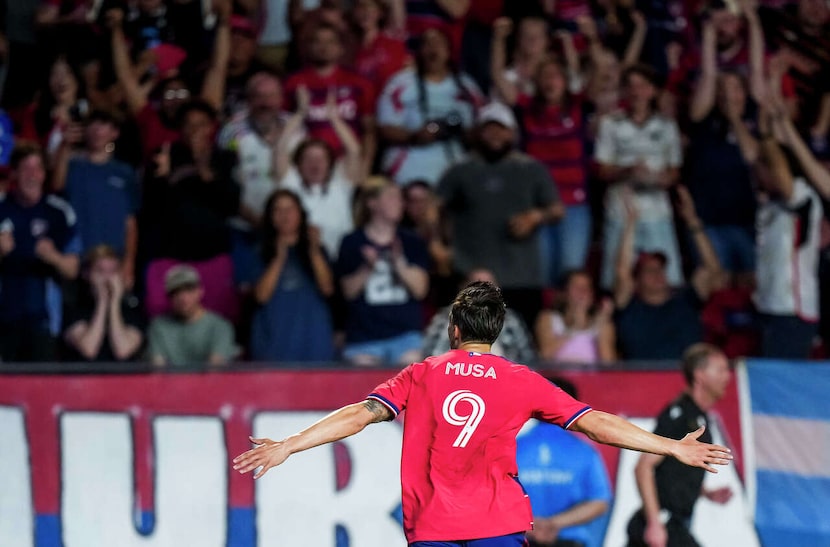 FC Dallas forward Petar Musa (9) celebrates after scoring a goal for the game-winner in the...