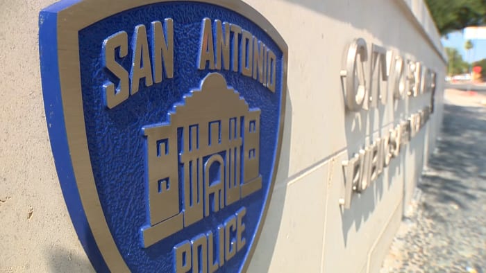SAPD officer suspended after detectives find woman wanted on felony warrant riding in his car