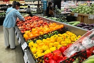A person shops at a grocery store in Schaumburg, Ill., Thursday, Sept. 18, 2025. (AP...